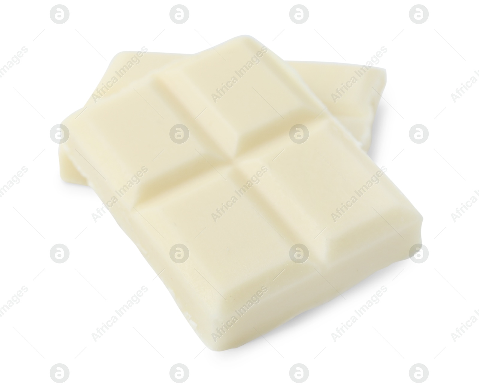 Photo of Pieces of delicious white chocolate isolated on white