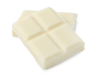 Photo of Pieces of delicious white chocolate isolated on white