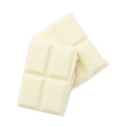 Photo of Pieces of delicious white chocolate isolated on white, top view