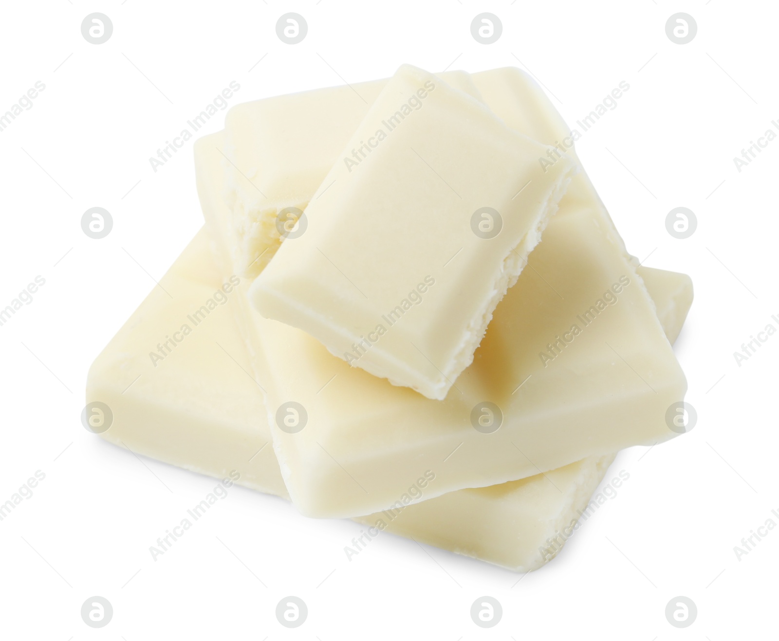 Photo of Pieces of delicious white chocolate isolated on white