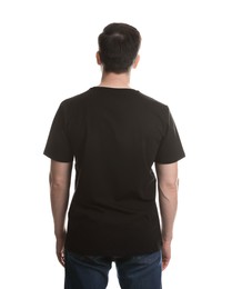 Photo of Man in blank black t-shirt on white background, back view. Mockup for design