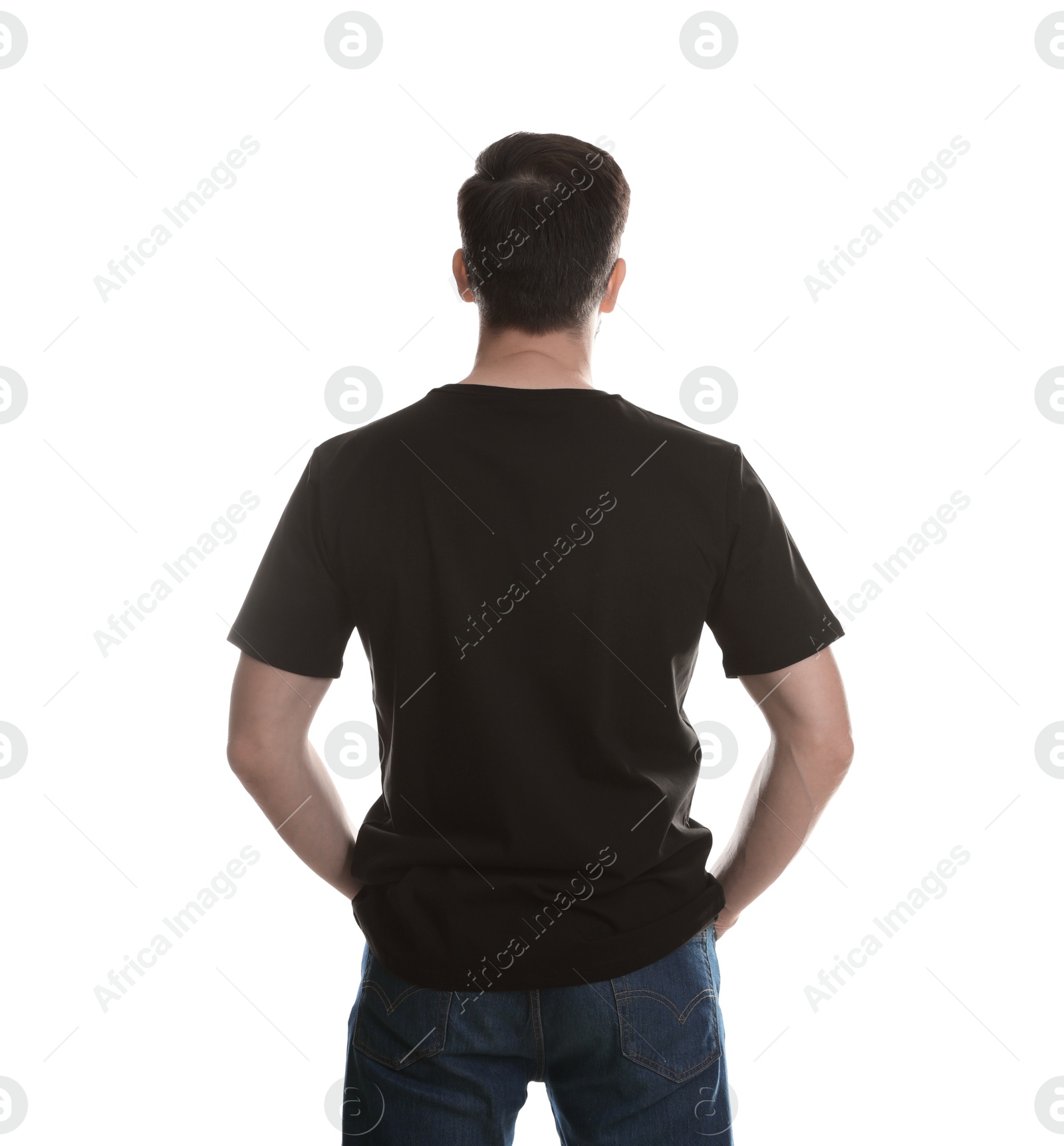 Photo of Man in blank black t-shirt on white background, back view. Mockup for design