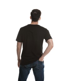 Photo of Man in blank black t-shirt on white background, back view. Mockup for design