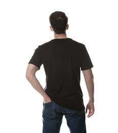 Photo of Man in blank black t-shirt on white background, back view. Mockup for design