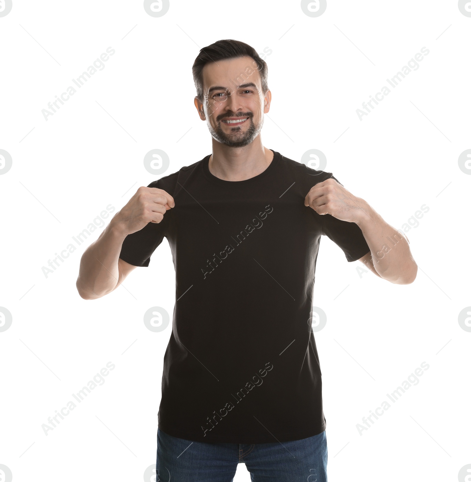 Photo of Man in blank black t-shirt on white background. Mockup for design