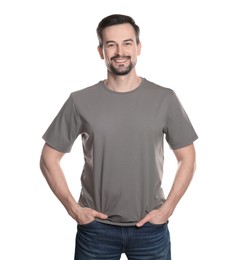 Photo of Man in blank grey t-shirt on white background. Mockup for design