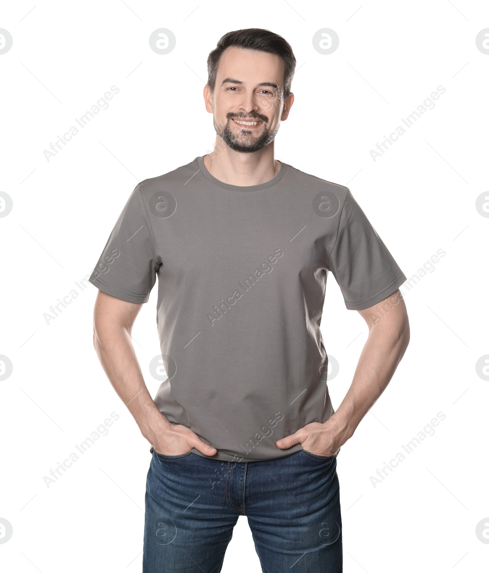 Photo of Man in blank grey t-shirt on white background. Mockup for design