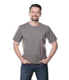 Photo of Man in blank grey t-shirt on white background. Mockup for design