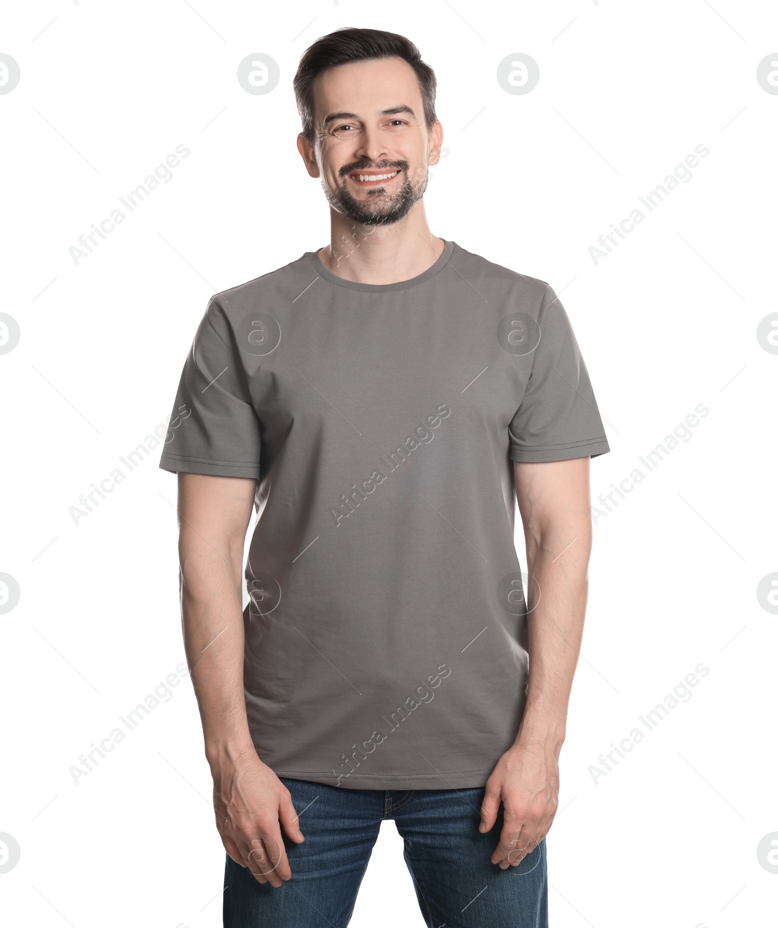 Photo of Man in blank grey t-shirt on white background. Mockup for design