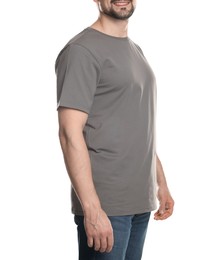 Photo of Man in blank grey t-shirt on white background, closeup. Mockup for design