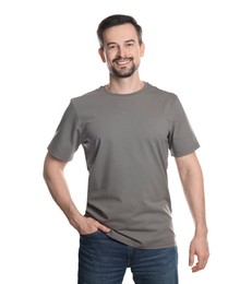 Photo of Man in blank grey t-shirt on white background. Mockup for design