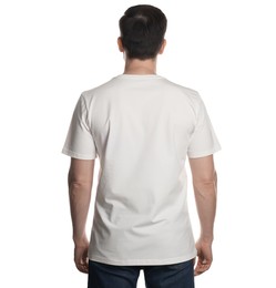 Photo of Man in blank t-shirt on white background, back view. Mockup for design