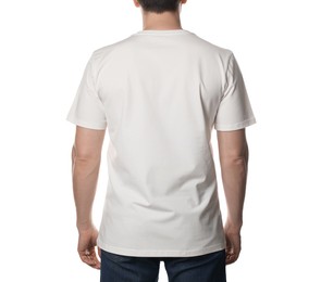 Photo of Man in blank t-shirt on white background, back view. Mockup for design