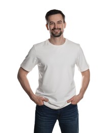 Photo of Man in blank t-shirt on white background. Mockup for design