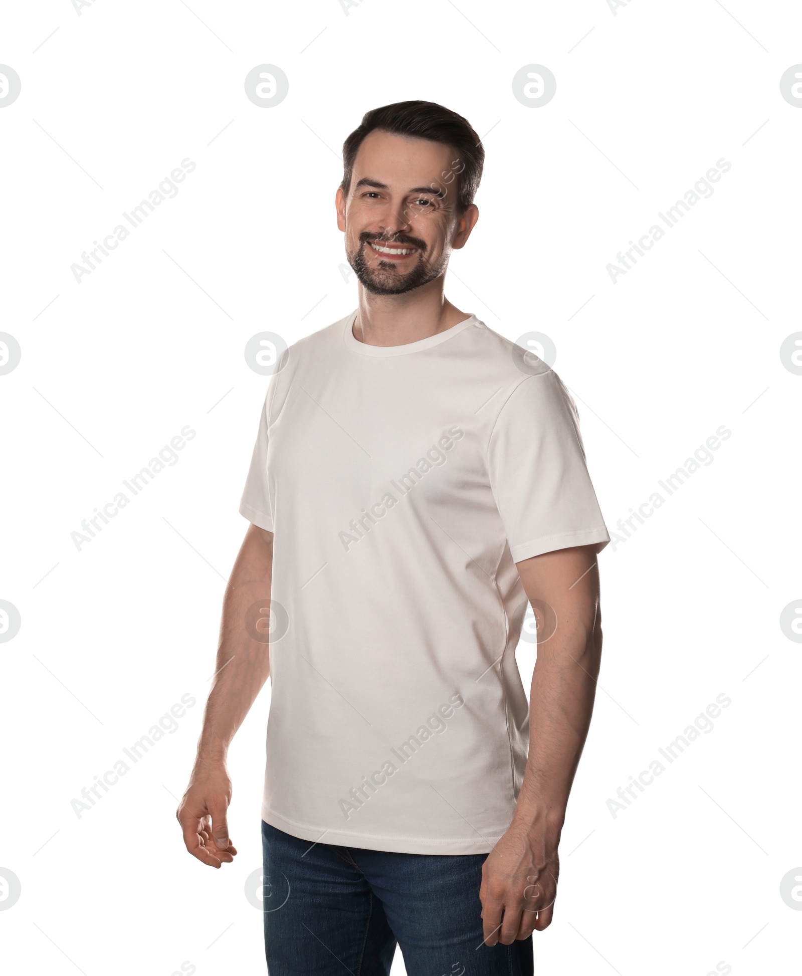 Photo of Man in blank t-shirt on white background. Mockup for design