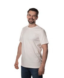 Photo of Man in blank t-shirt on white background. Mockup for design