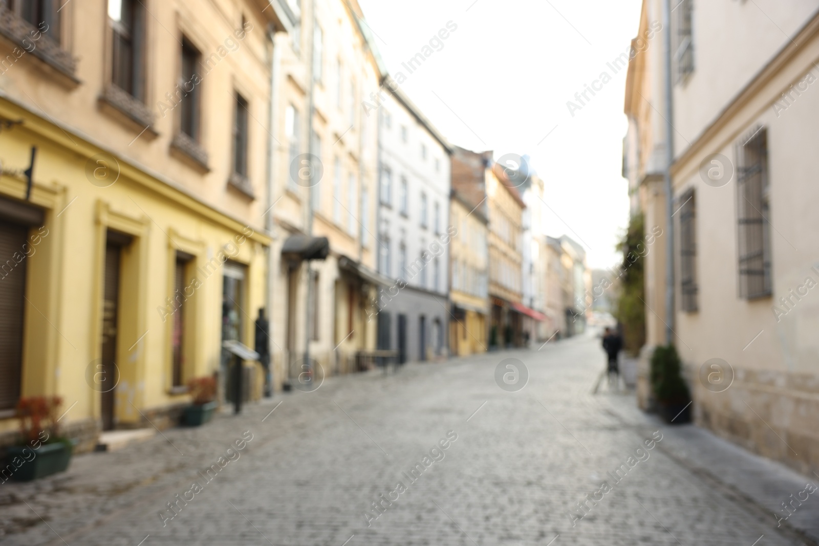 Photo of Blurred view of beautiful buildings on city street