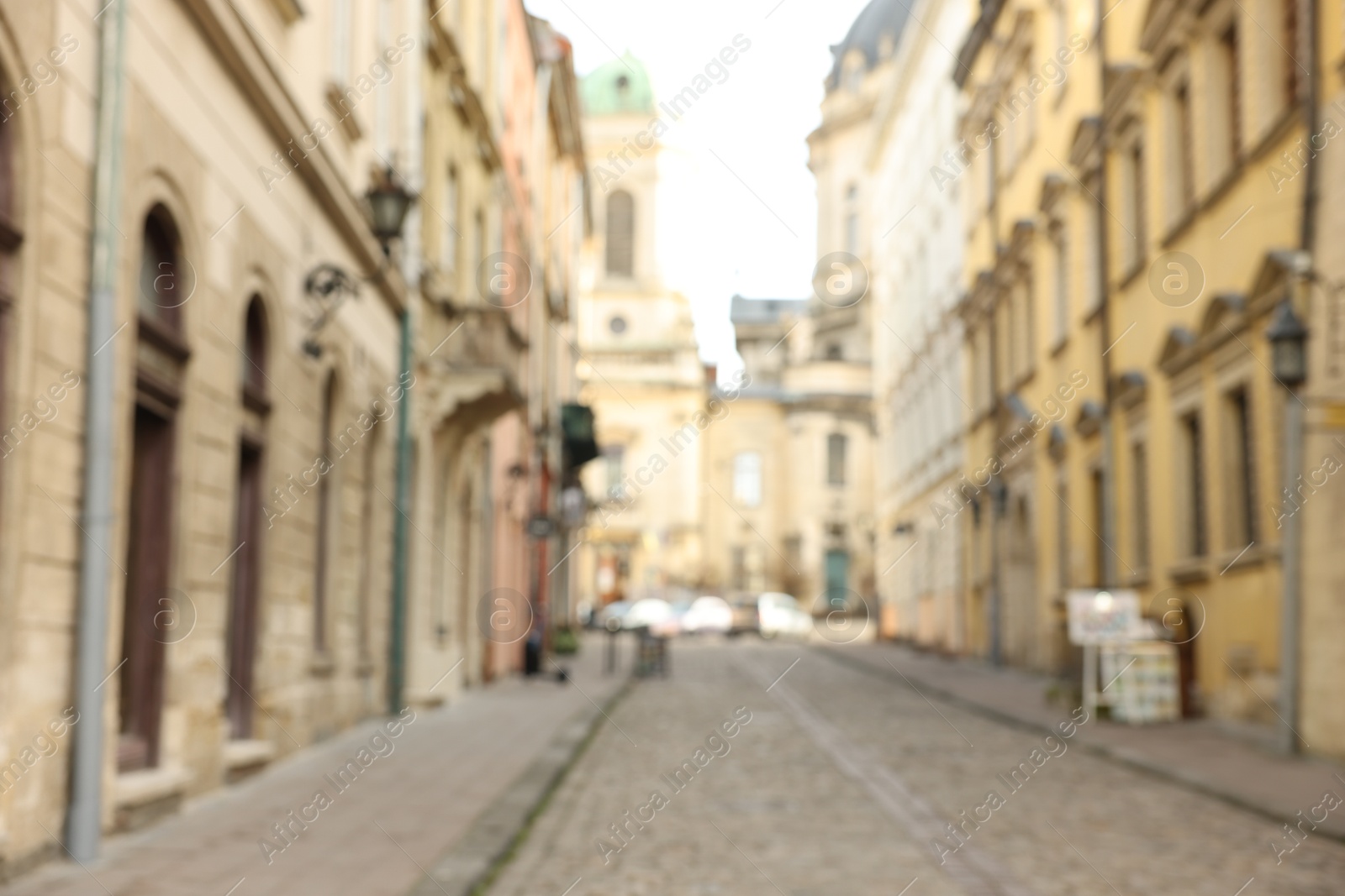 Photo of Blurred view of beautiful buildings on city street