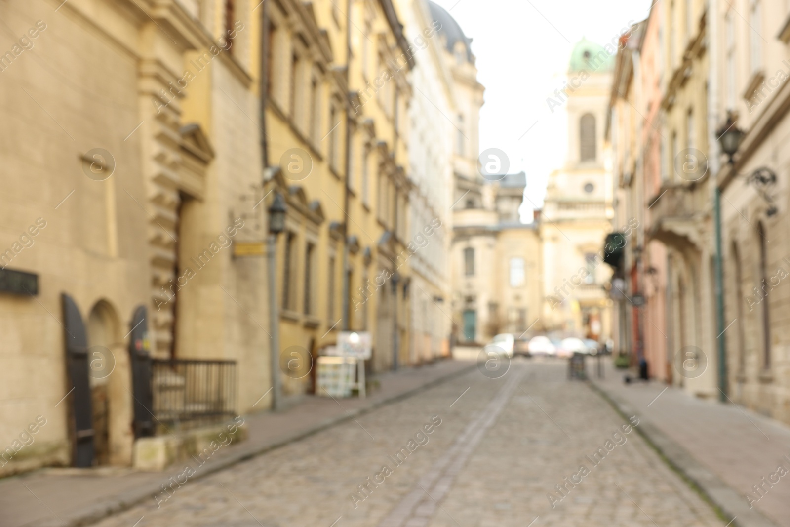 Photo of Blurred view of beautiful buildings on city street