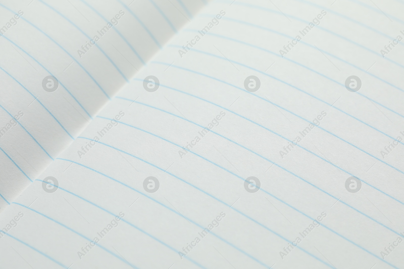 Photo of Copybook paper sheets as background, closeup. School stationery