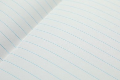 Photo of Copybook paper sheets as background, closeup. School stationery