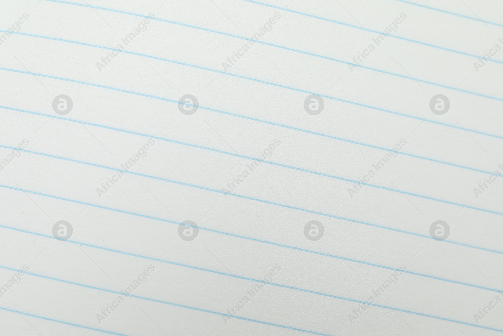 Photo of Copybook paper sheet as background, top view. School stationery