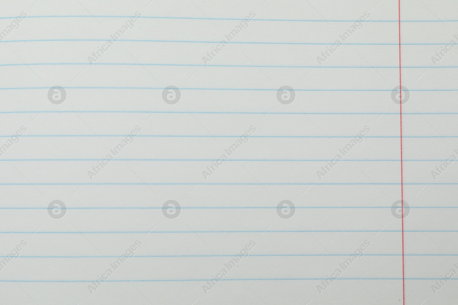 Photo of Copybook paper sheet as background, top view. School stationery