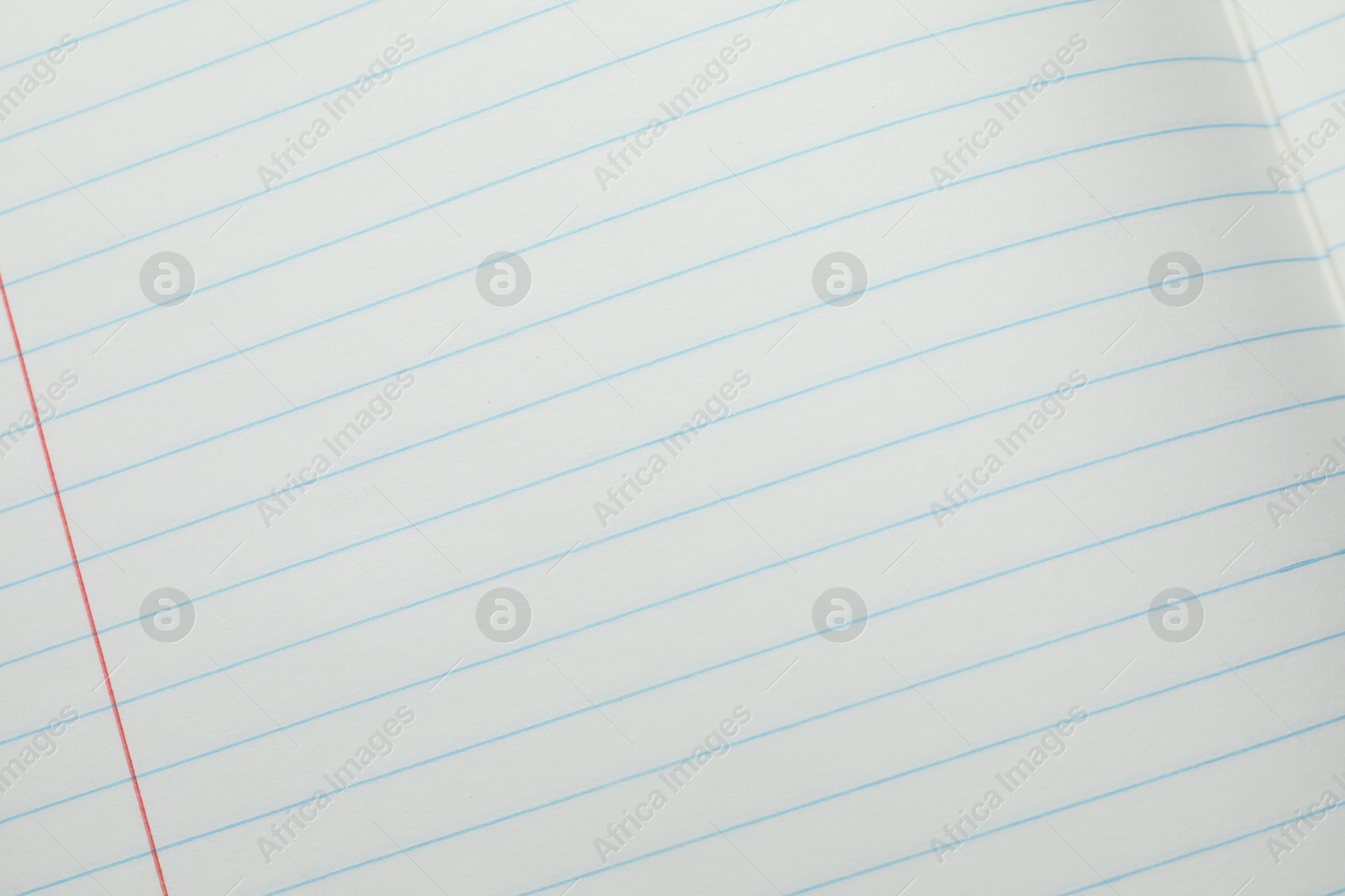 Photo of Copybook paper sheet as background, top view. School stationery