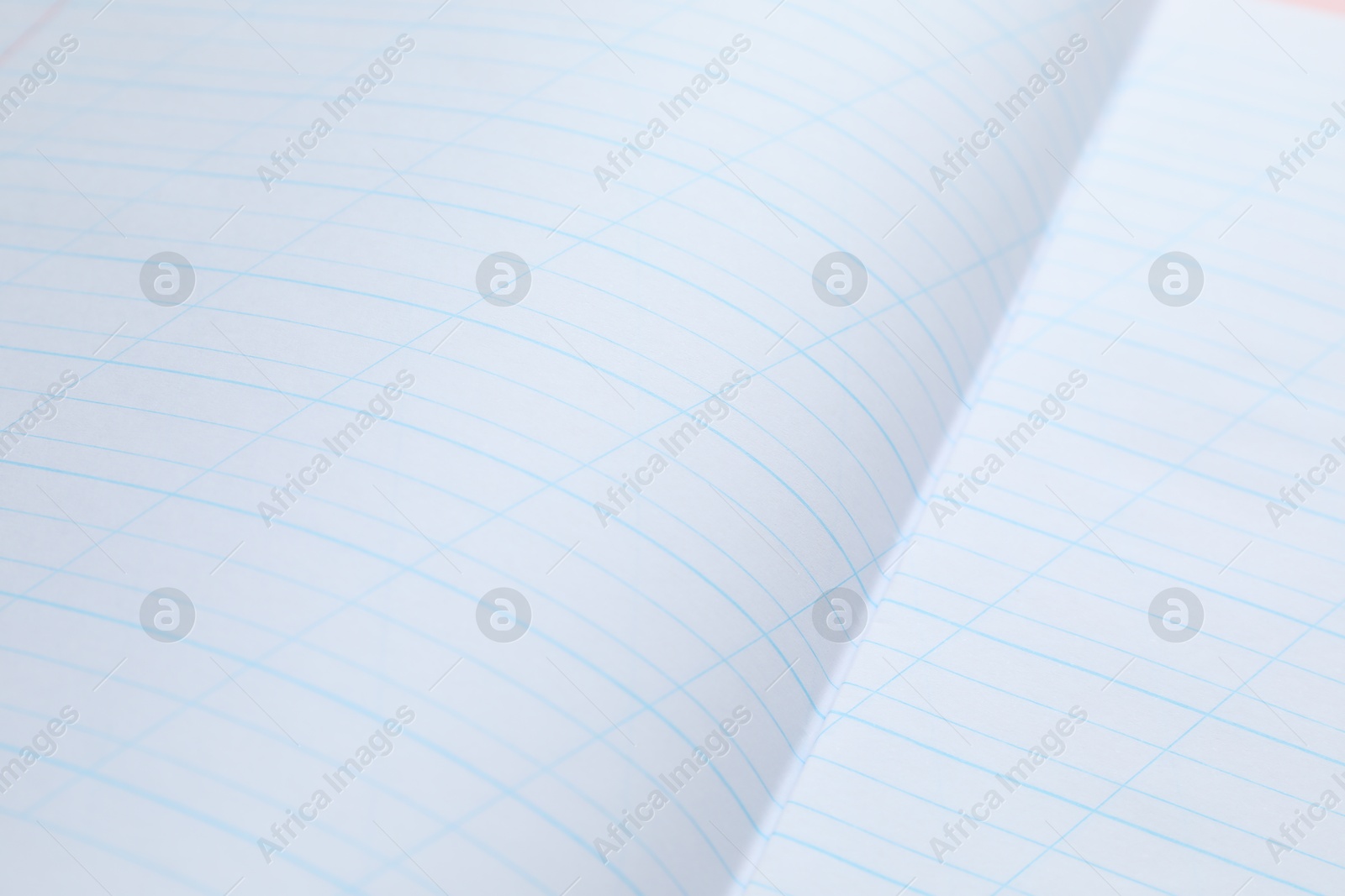 Photo of Copybook paper sheets as background, closeup. School stationery