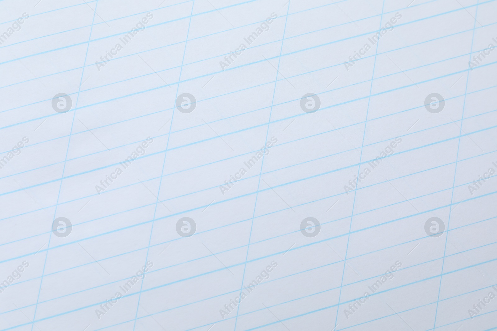 Photo of Copybook paper sheet as background, top view. School stationery