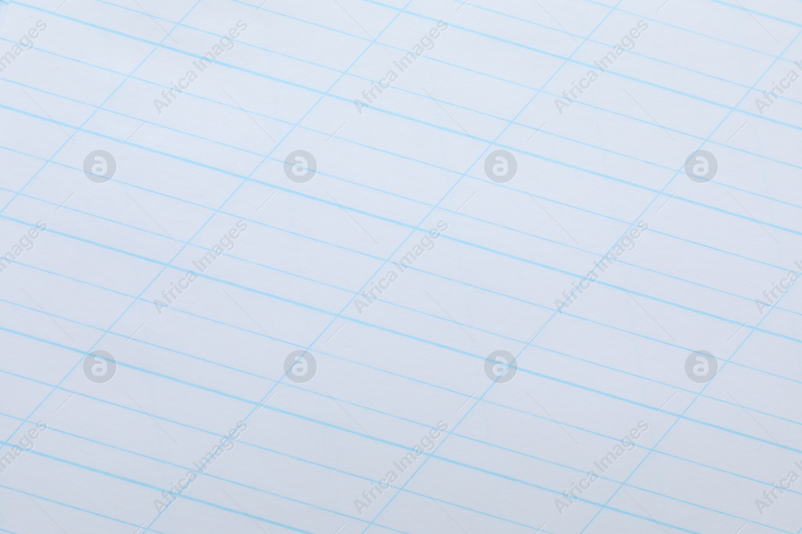 Photo of Copybook paper sheet as background, closeup. School stationery