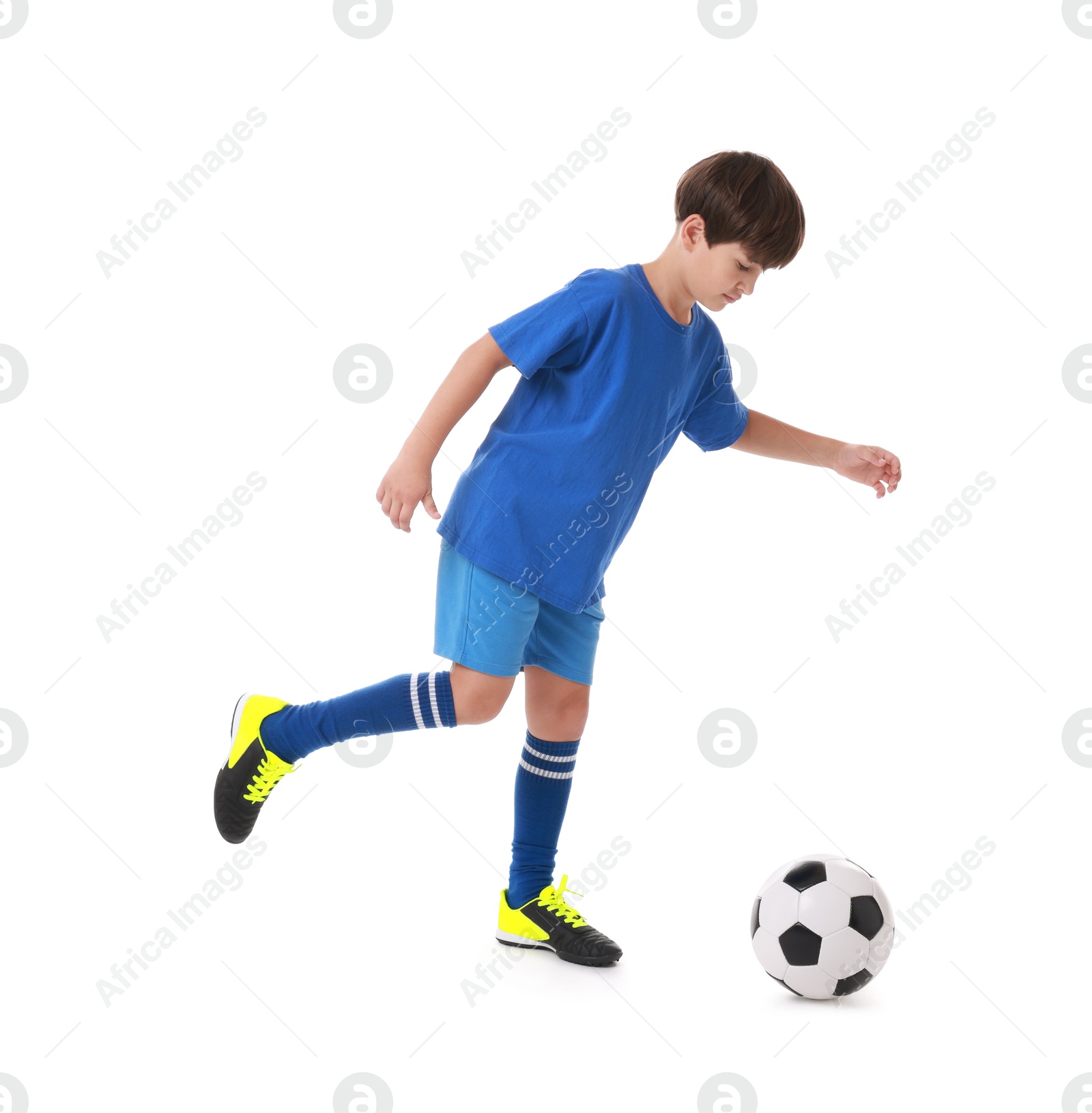 Photo of Boy with soccer ball playing football on white background