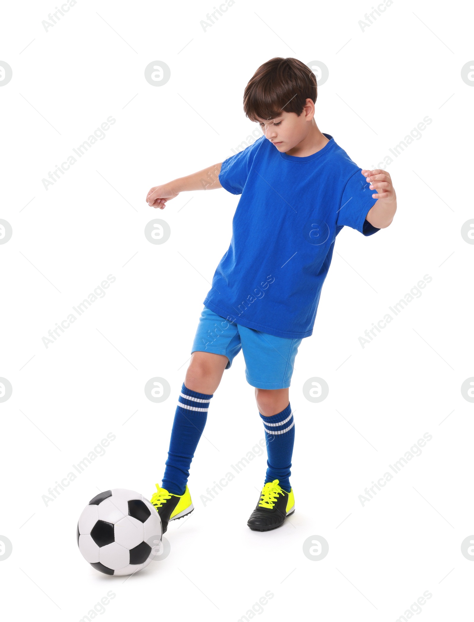 Photo of Boy with soccer ball playing football on white background