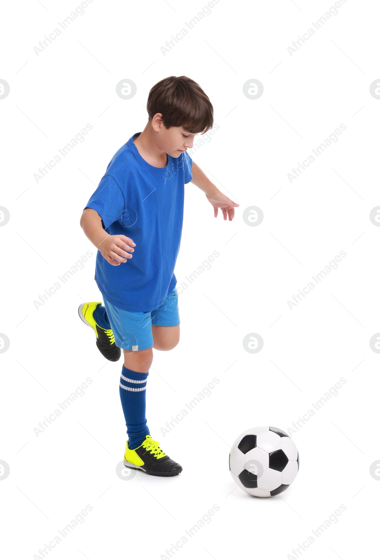 Photo of Boy with soccer ball playing football on white background