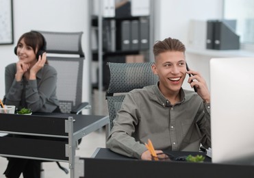 Photo of Sales department. People working in office, selective focus