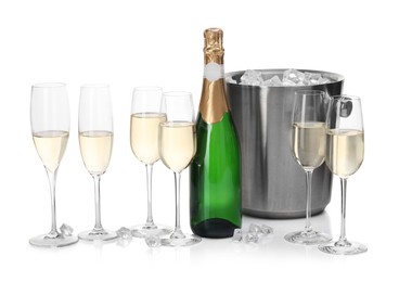 Photo of Champagne and bucket with ice isolated on white