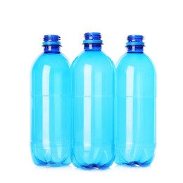 Photo of Many empty plastic bottles isolated on white