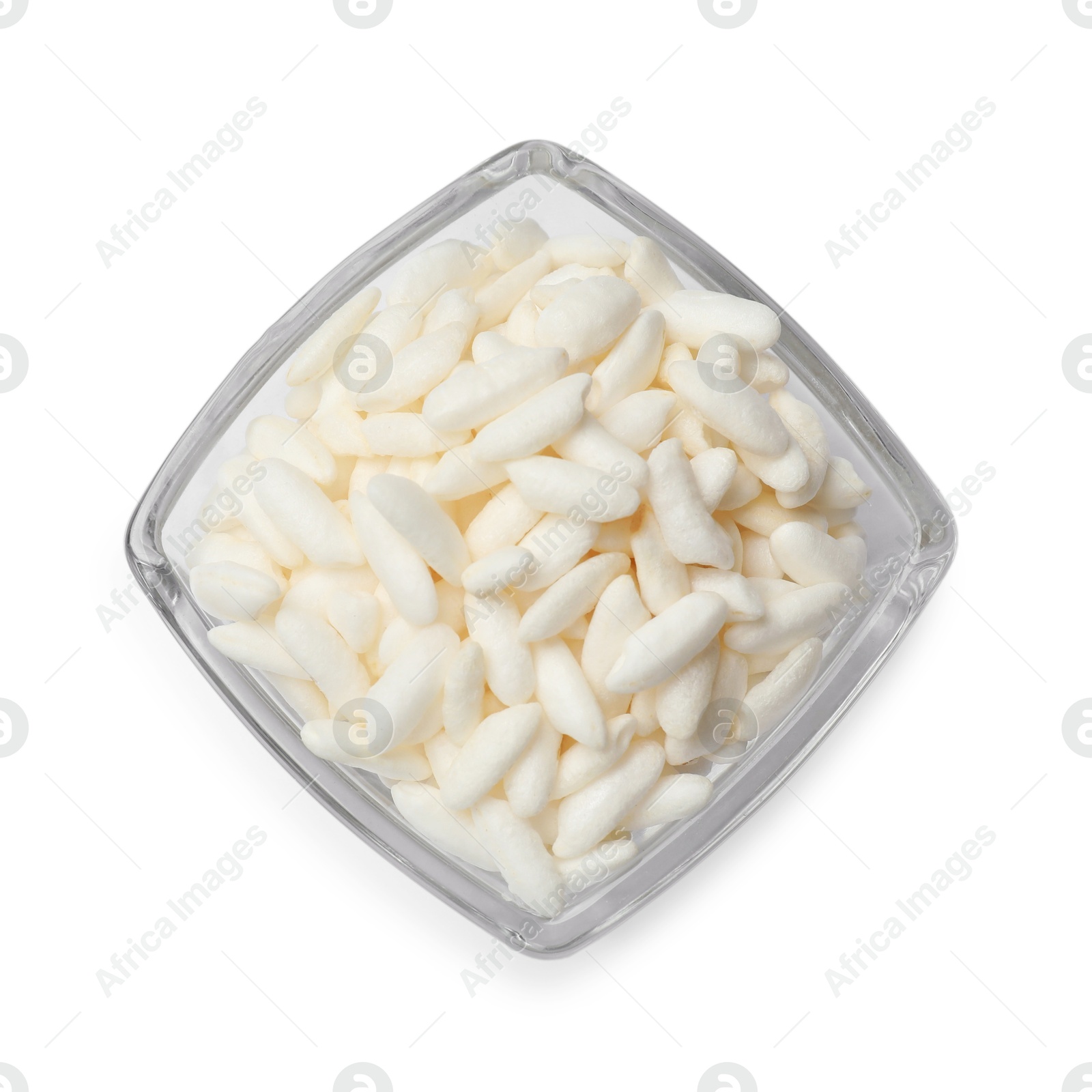 Photo of Puffed rice in bowl isolated on white, top view