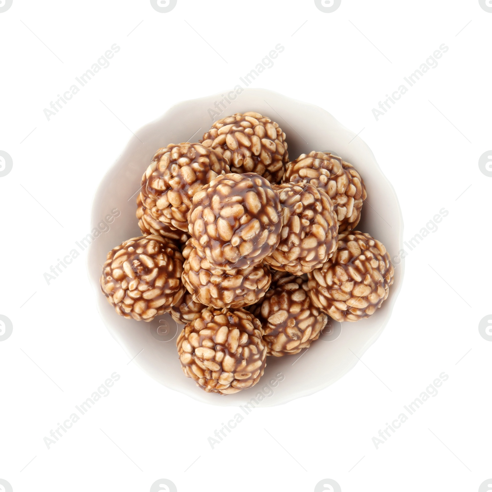 Photo of Delicious chocolate puffed rice balls in bowl isolated on white, top view