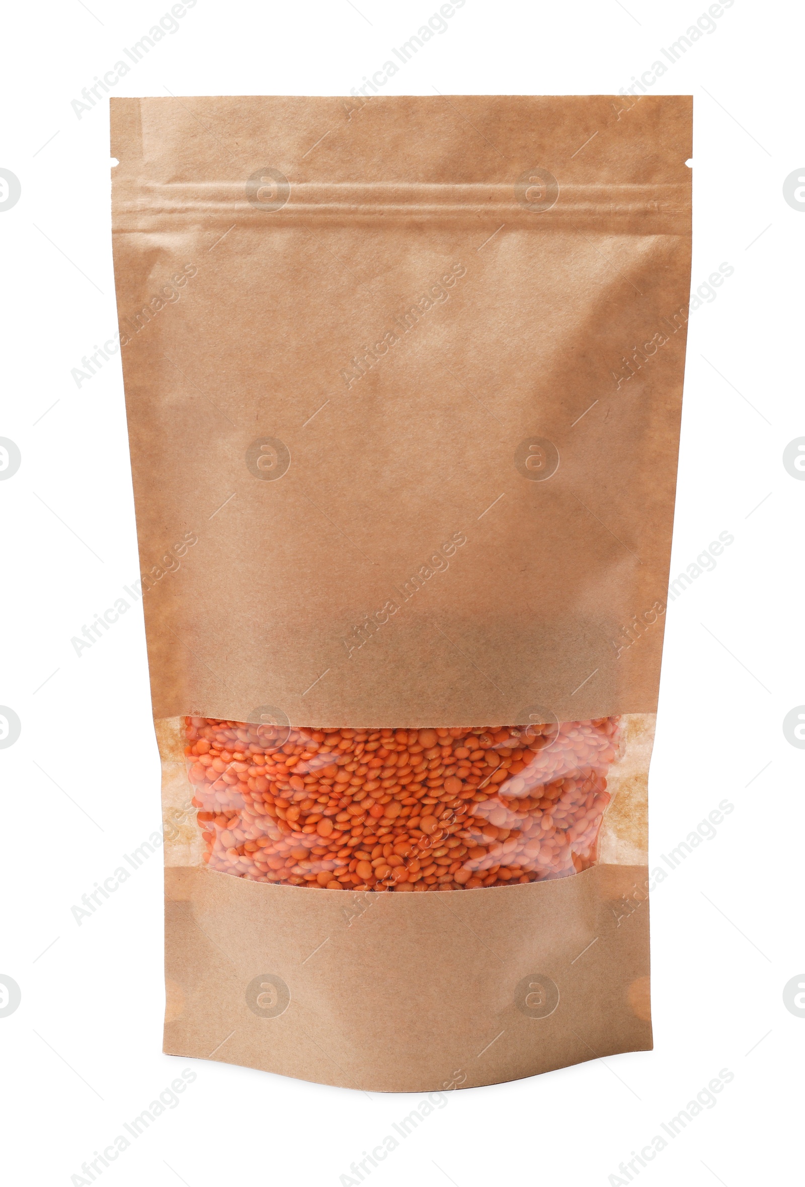 Photo of Paper pouch bag with lentil isolated on white