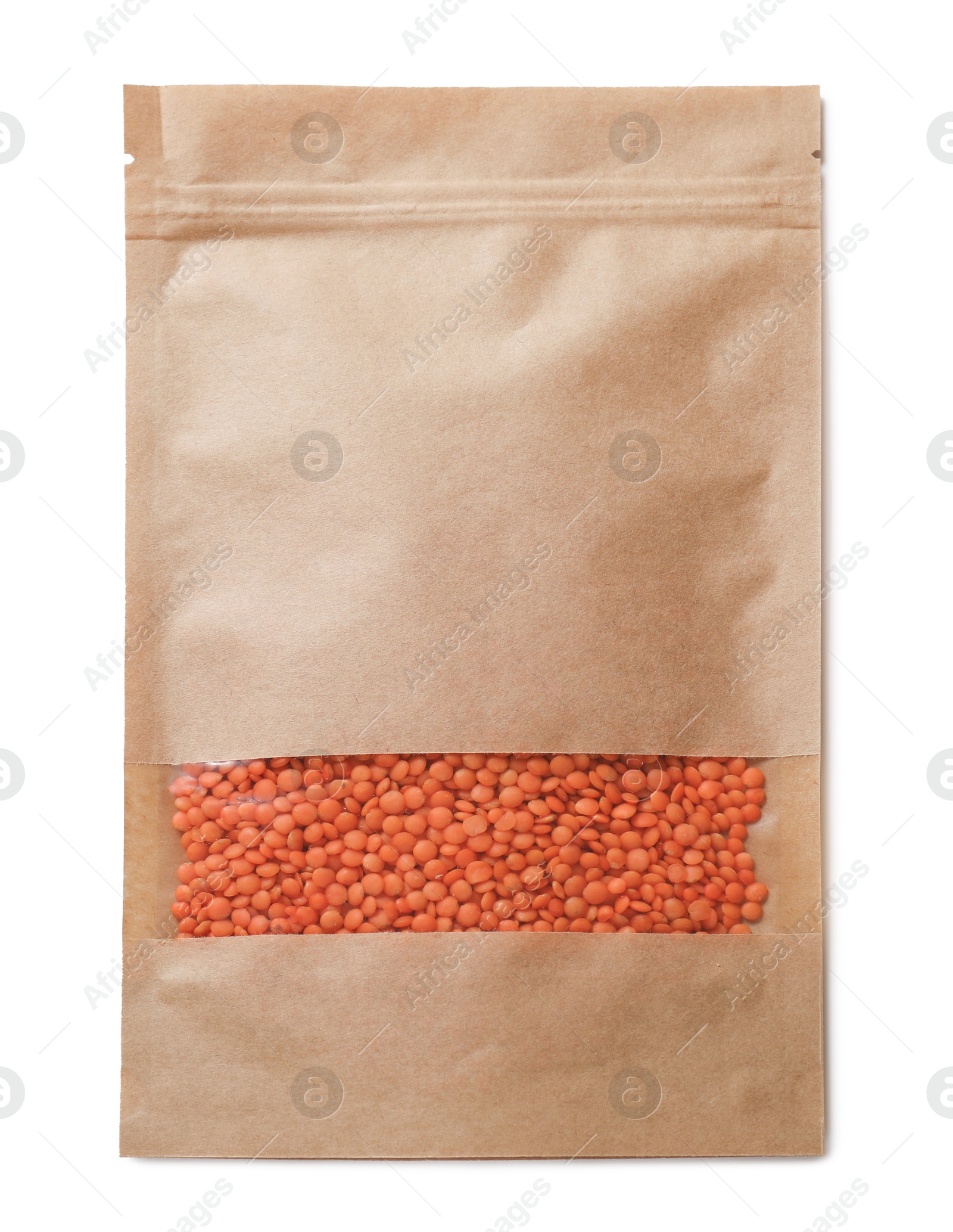 Photo of Paper pouch bag with lentil isolated on white, top view