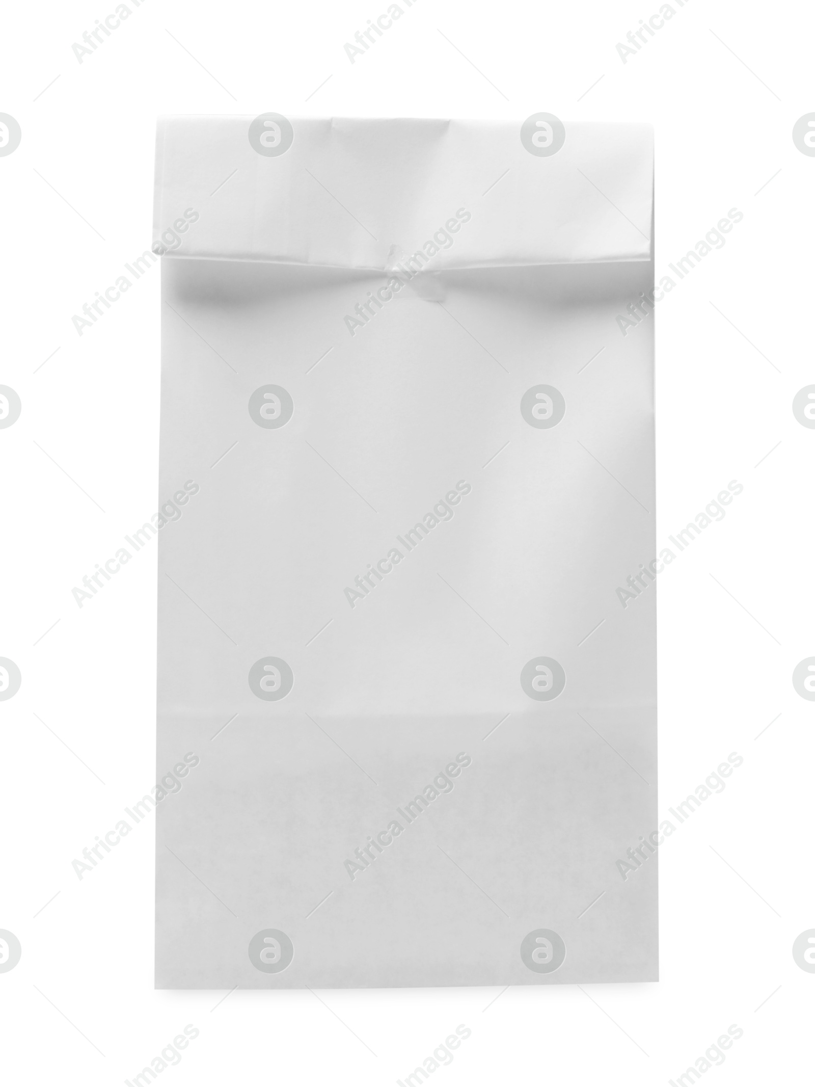 Photo of One closed paper bag isolated on white