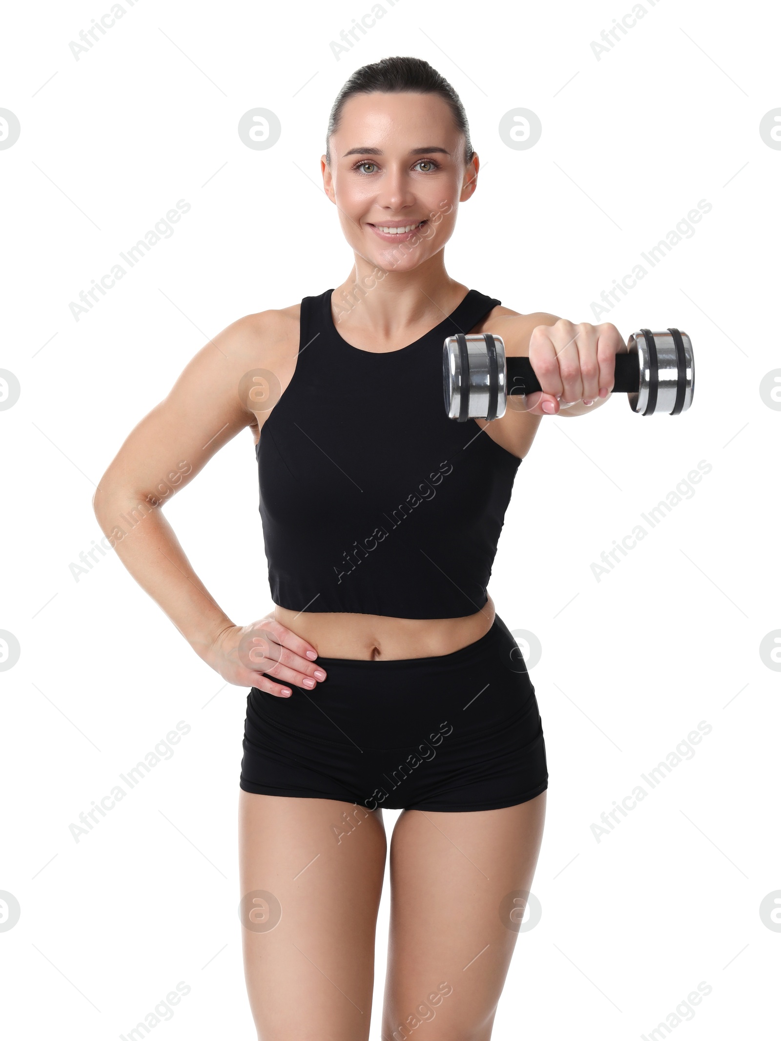 Photo of Woman exercising with dumbbell on white background