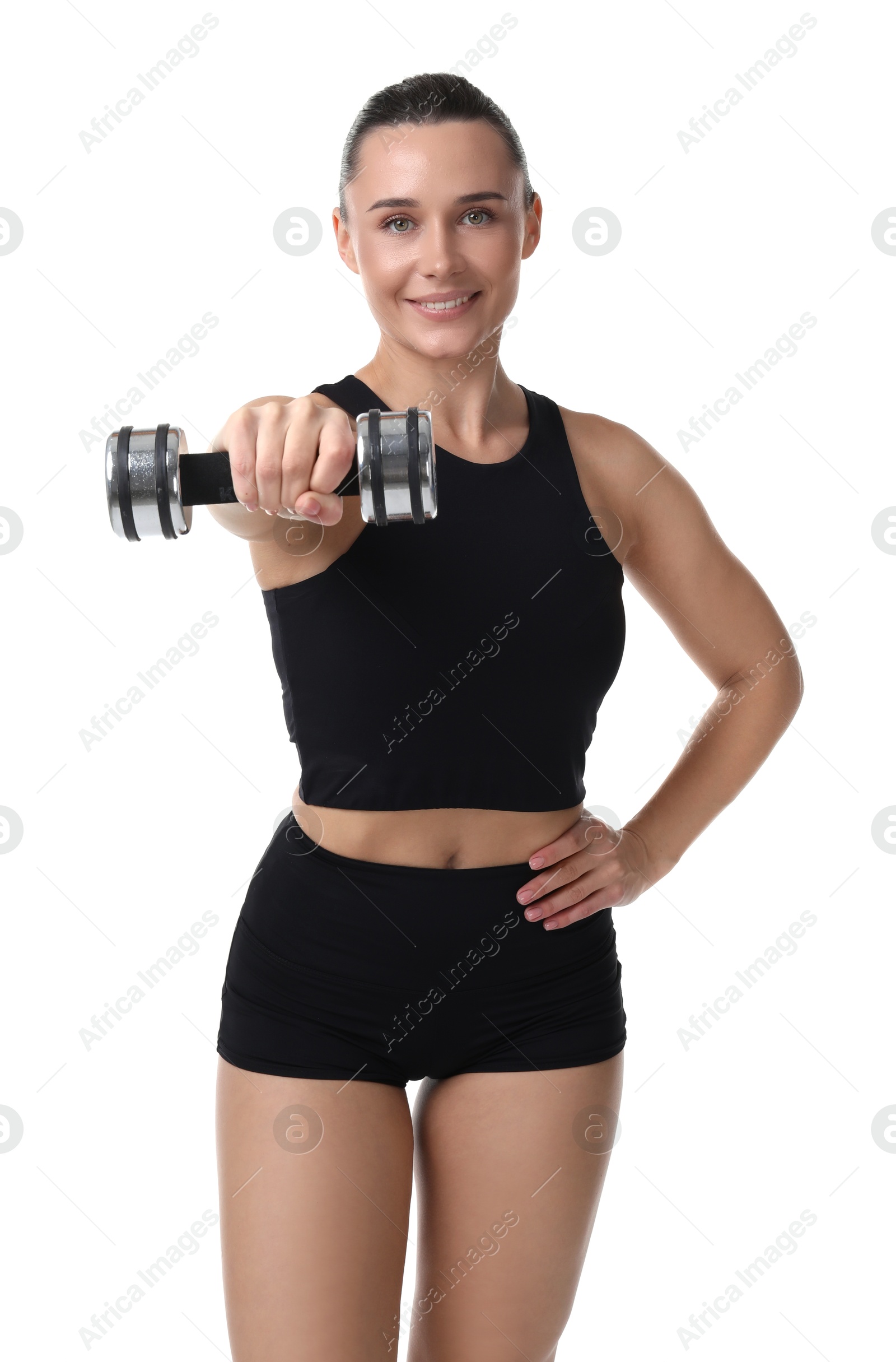 Photo of Woman exercising with dumbbell on white background