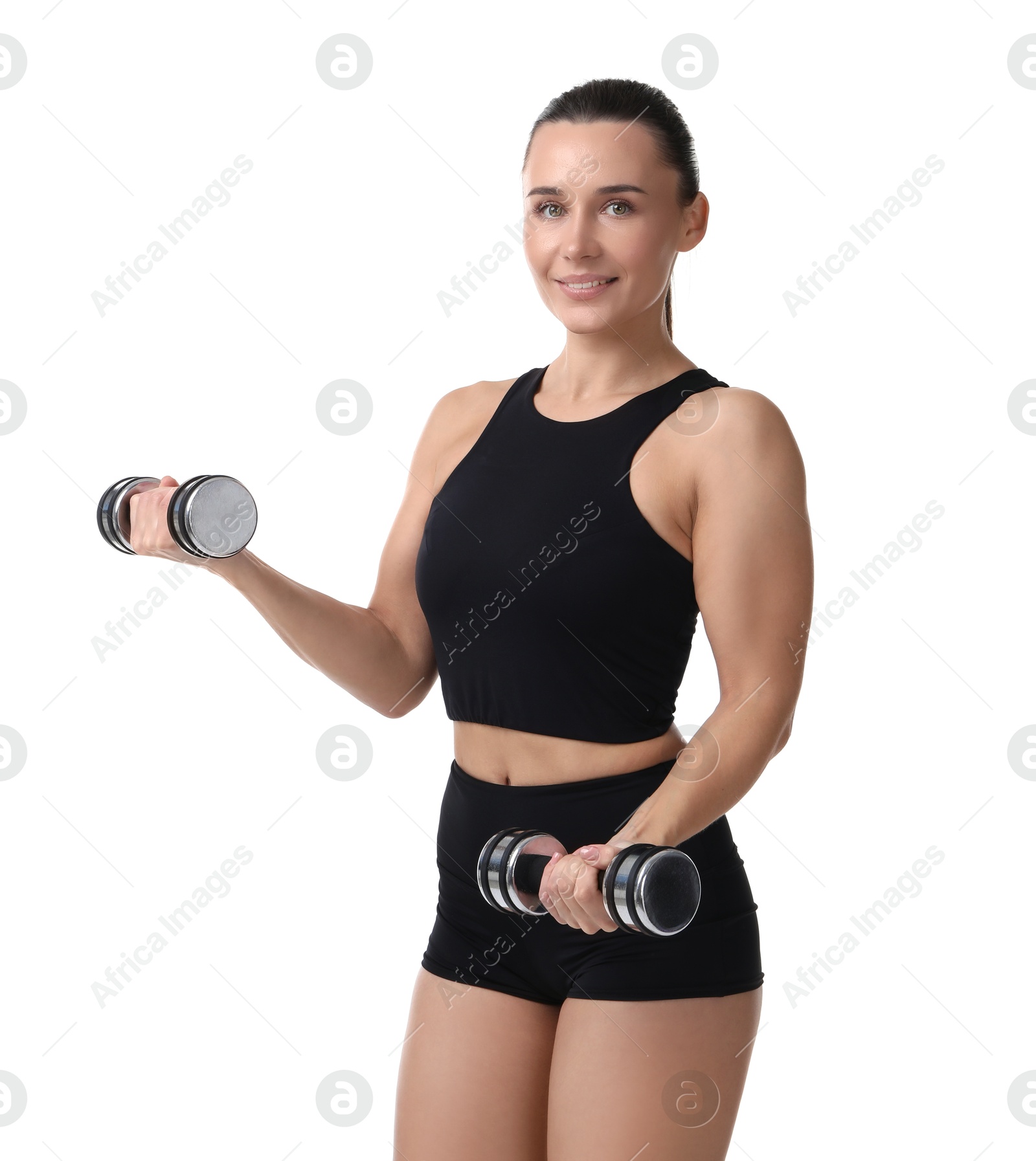 Photo of Woman exercising with dumbbells on white background