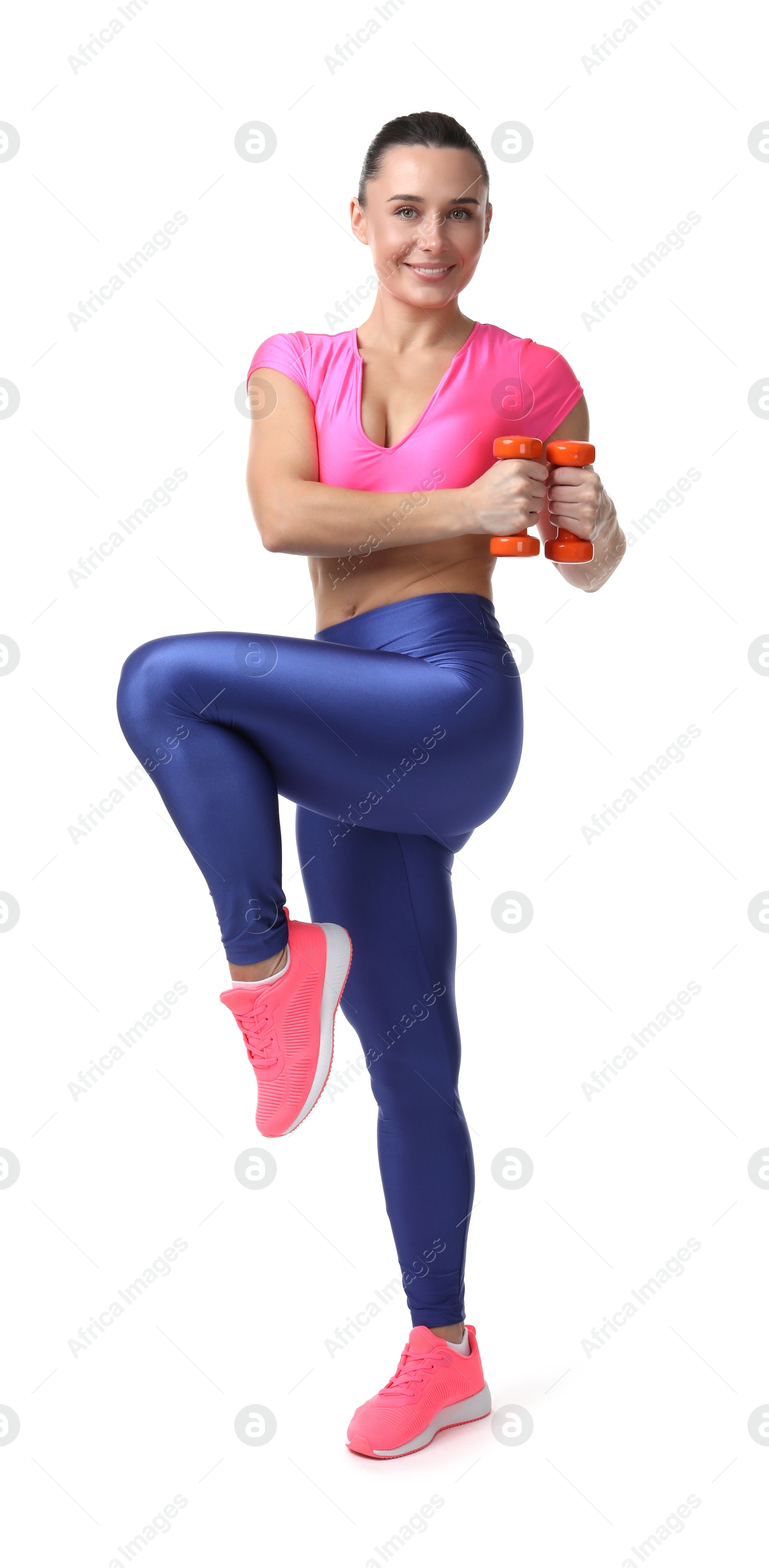 Photo of Woman exercising with dumbbells on white background