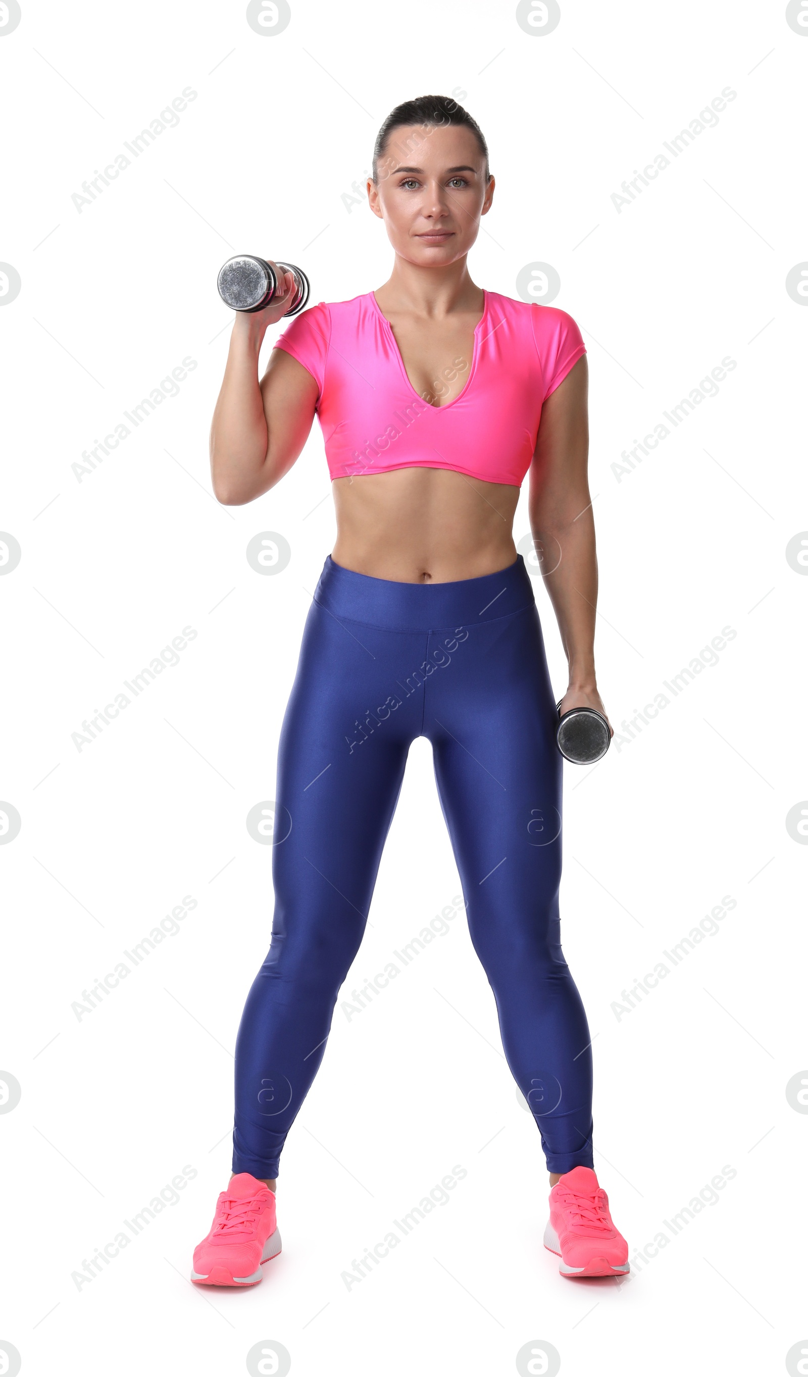 Photo of Woman exercising with dumbbells on white background