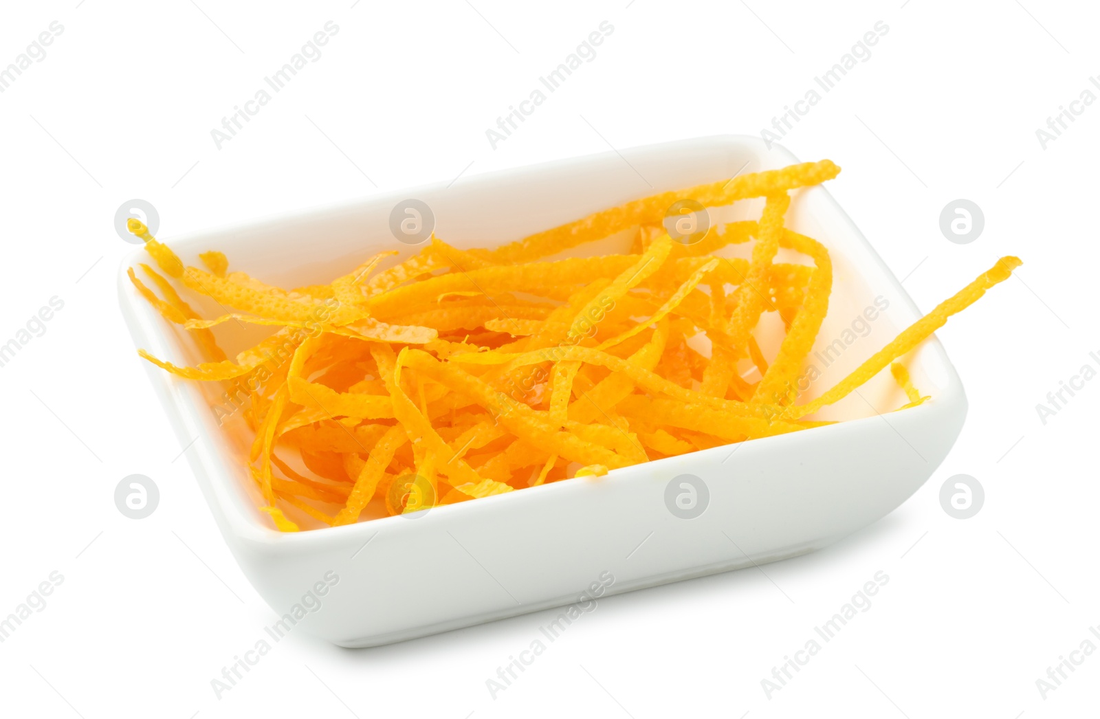 Photo of Orange zest in bowl isolated on white