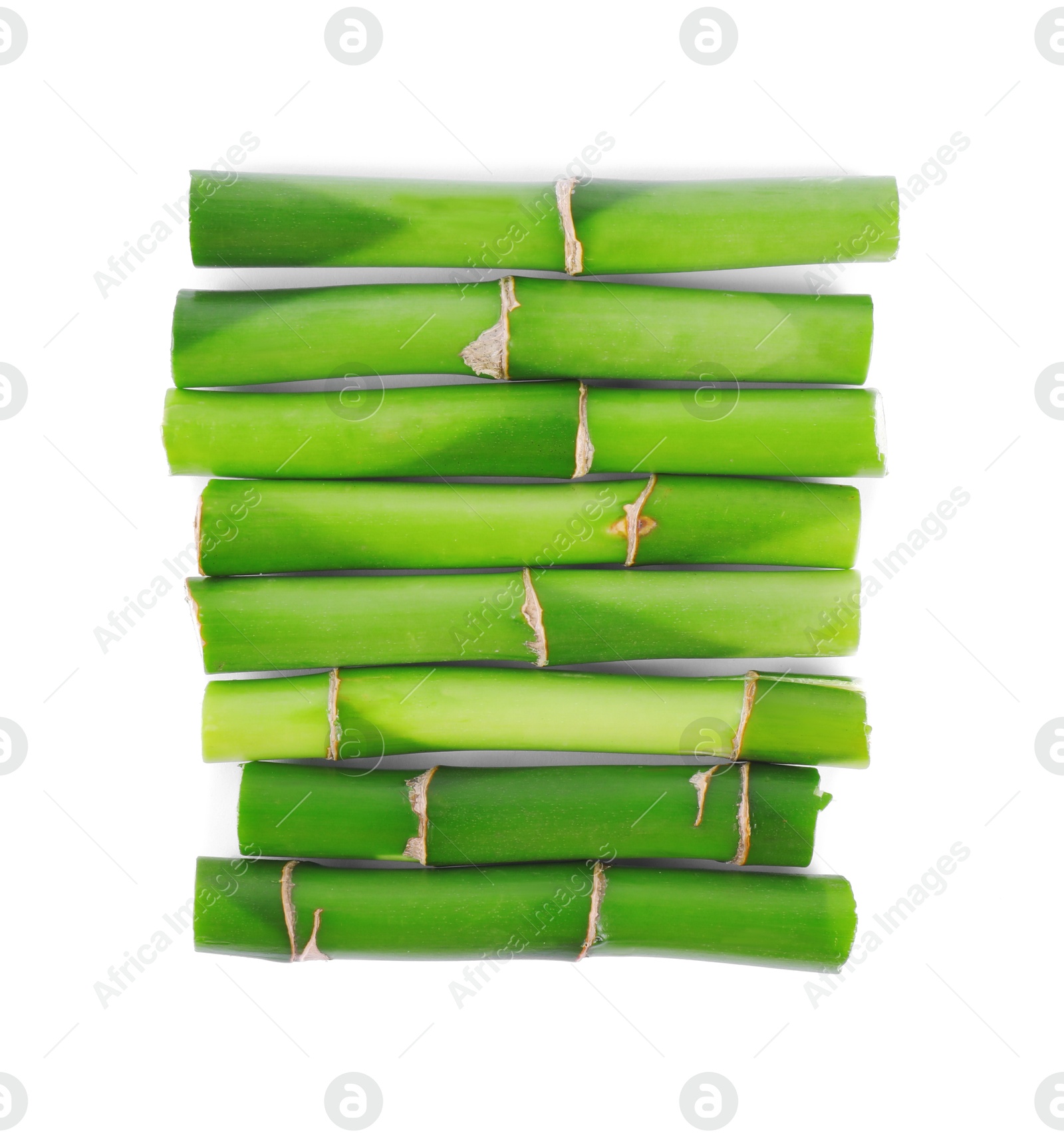 Photo of Pieces of decorative bamboo plant isolated on white, top view