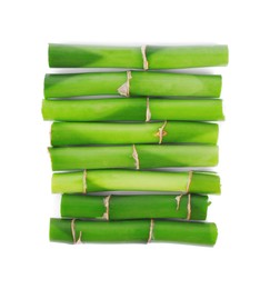 Pieces of decorative bamboo plant isolated on white, top view